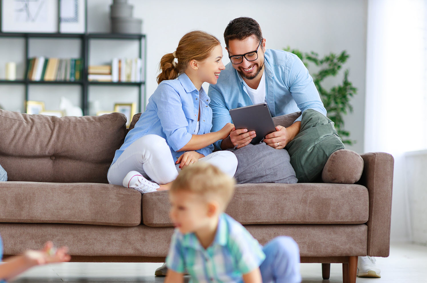 couple looking at a tablet