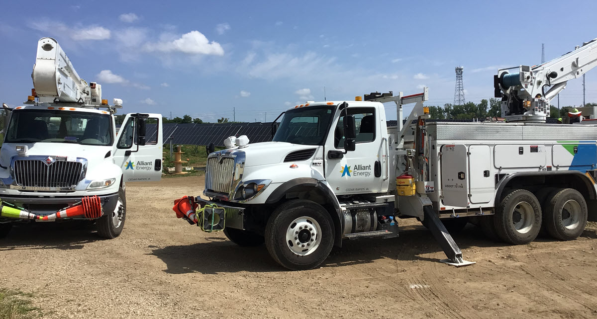 Alliant Energy trucks at the Cedar Rapids community solar site