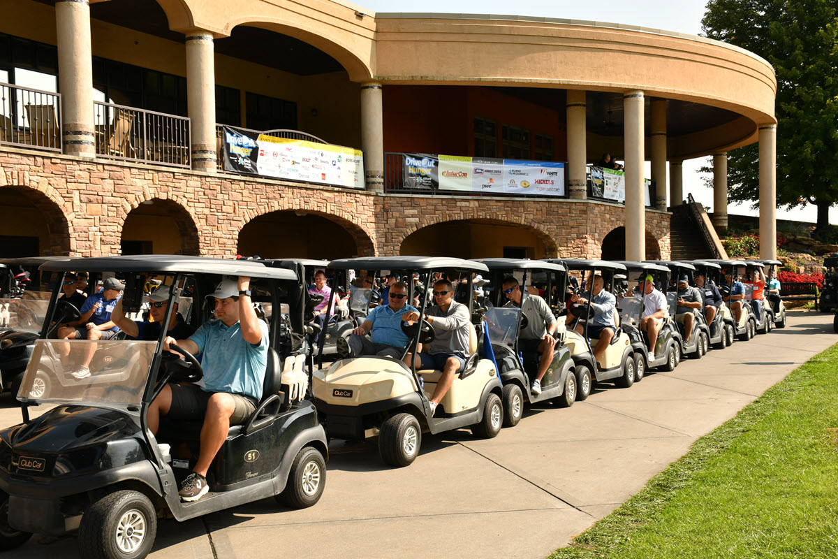golf carts in a line