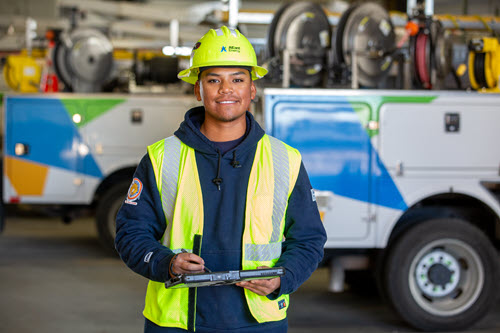 line technician near trucks