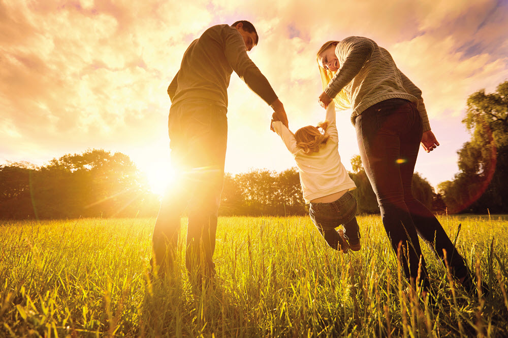 Family in a sunny field