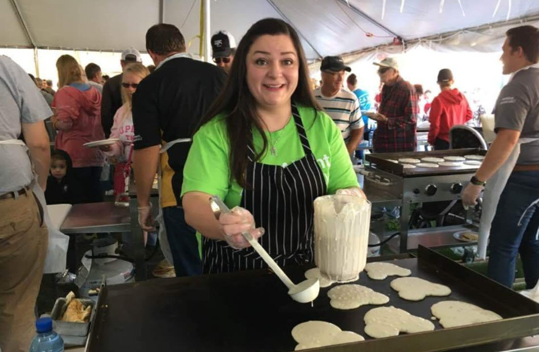 Ally Gearin making pancakes at a fundraiser