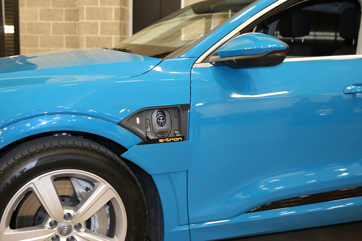 Battery electric vehicle open charging port. 