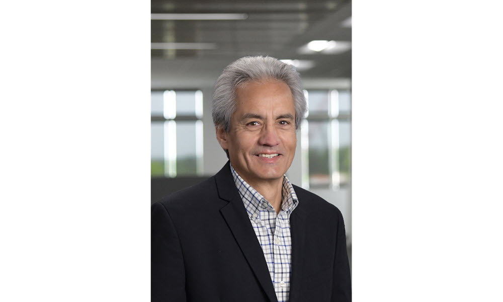 headshot of David de Leon, Alliant Energy