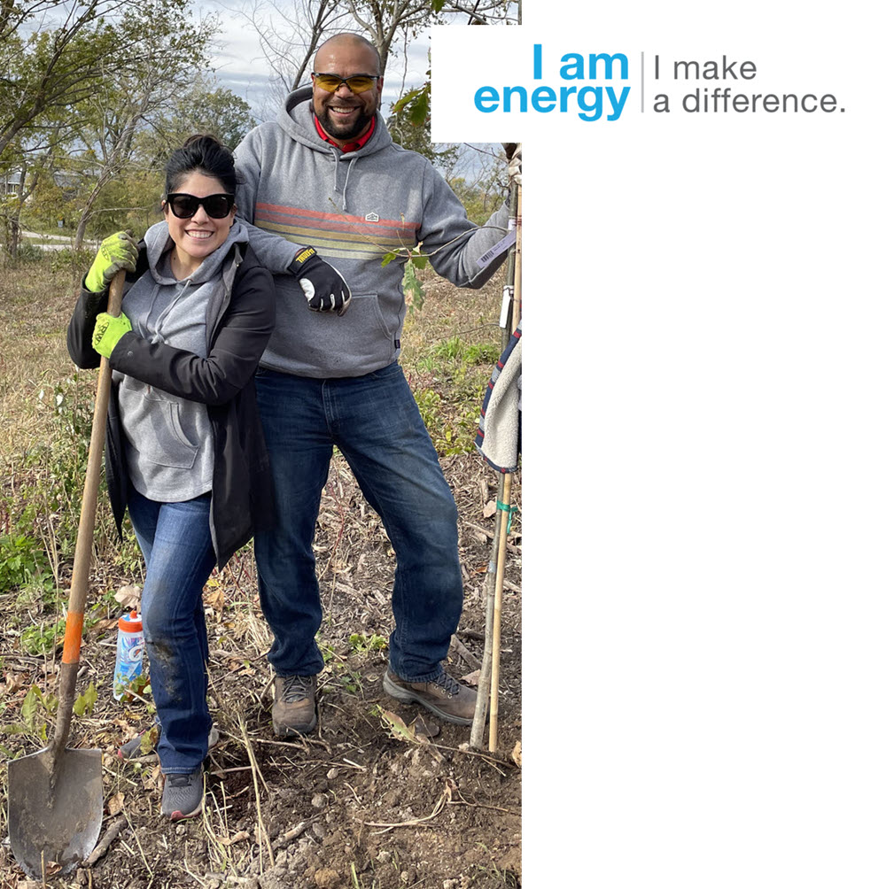 woman and man planting trees
