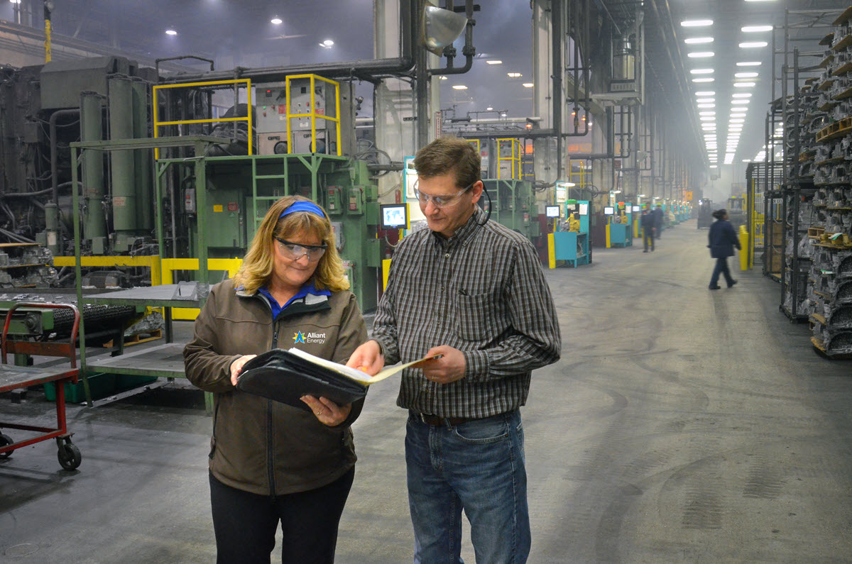 employee visiting industrial customer