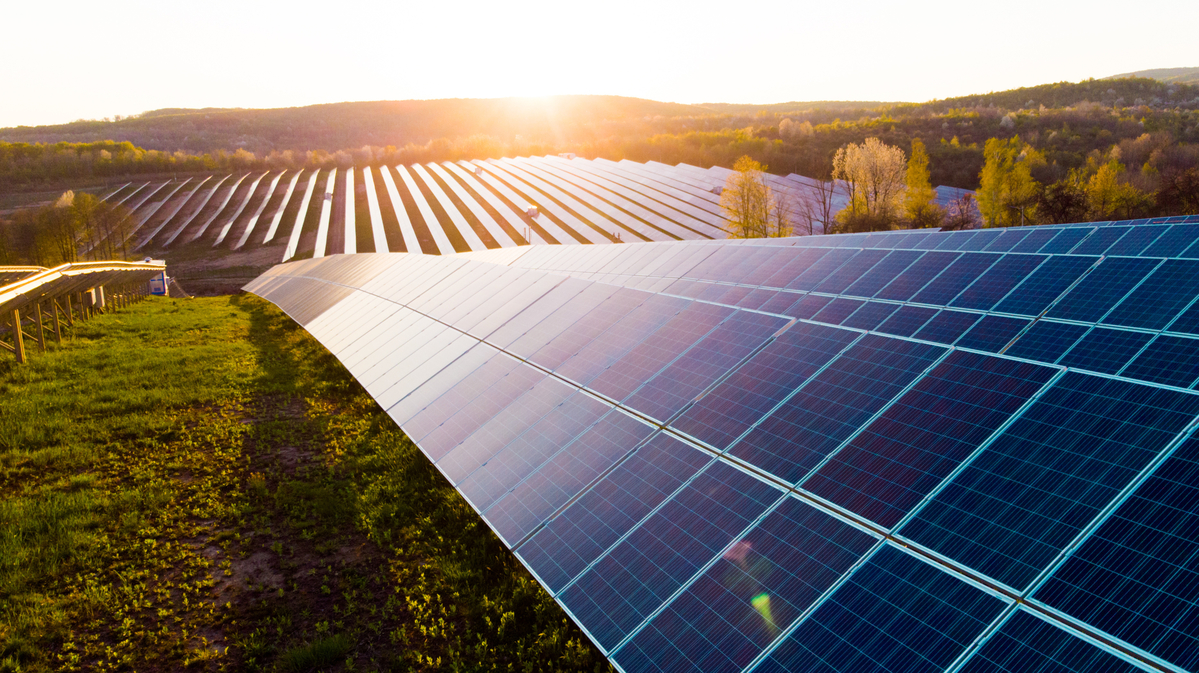 Solar panels on sunny hillside