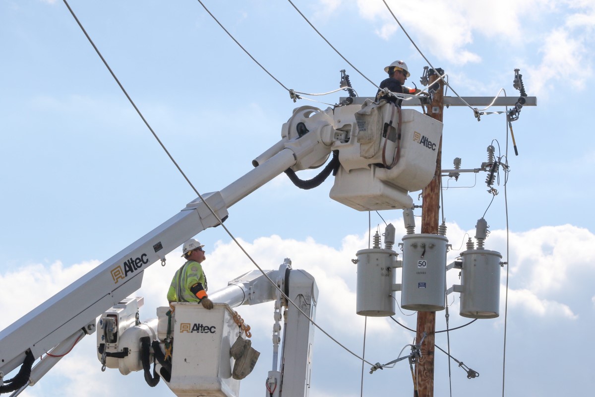 Crews work to restore power after a storm