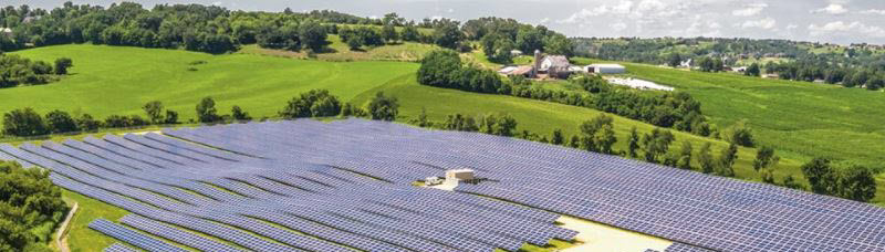 Solar panels in a large field from the air