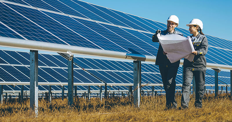 Solar panels construction workers