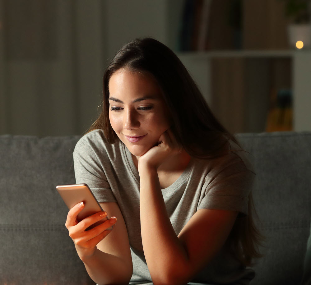 woman looking at phone