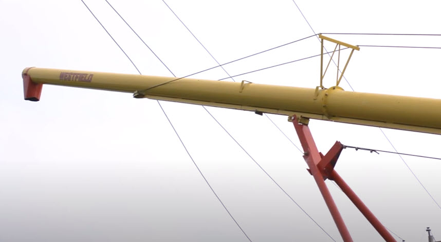 farm equipment near power lines