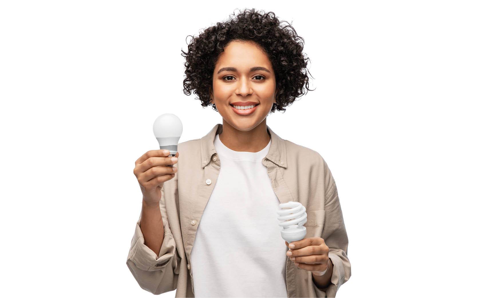 Woman holding energy-efficient light bulbs.