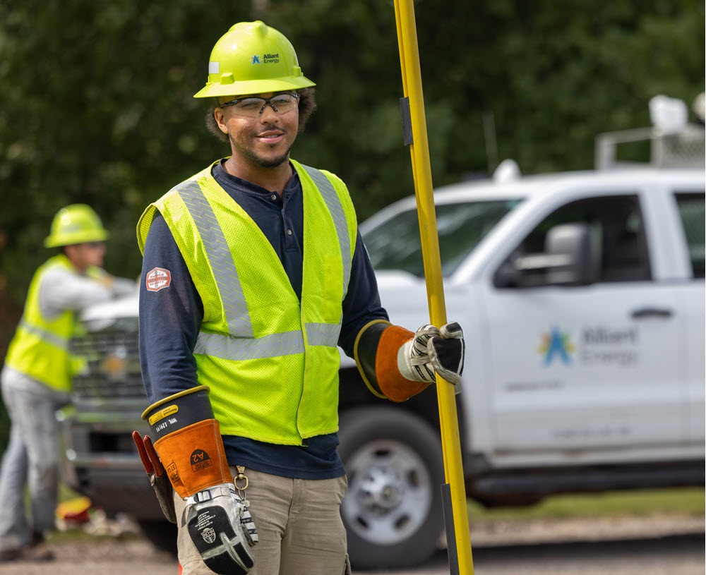 Alliant Energy employee in protective gear