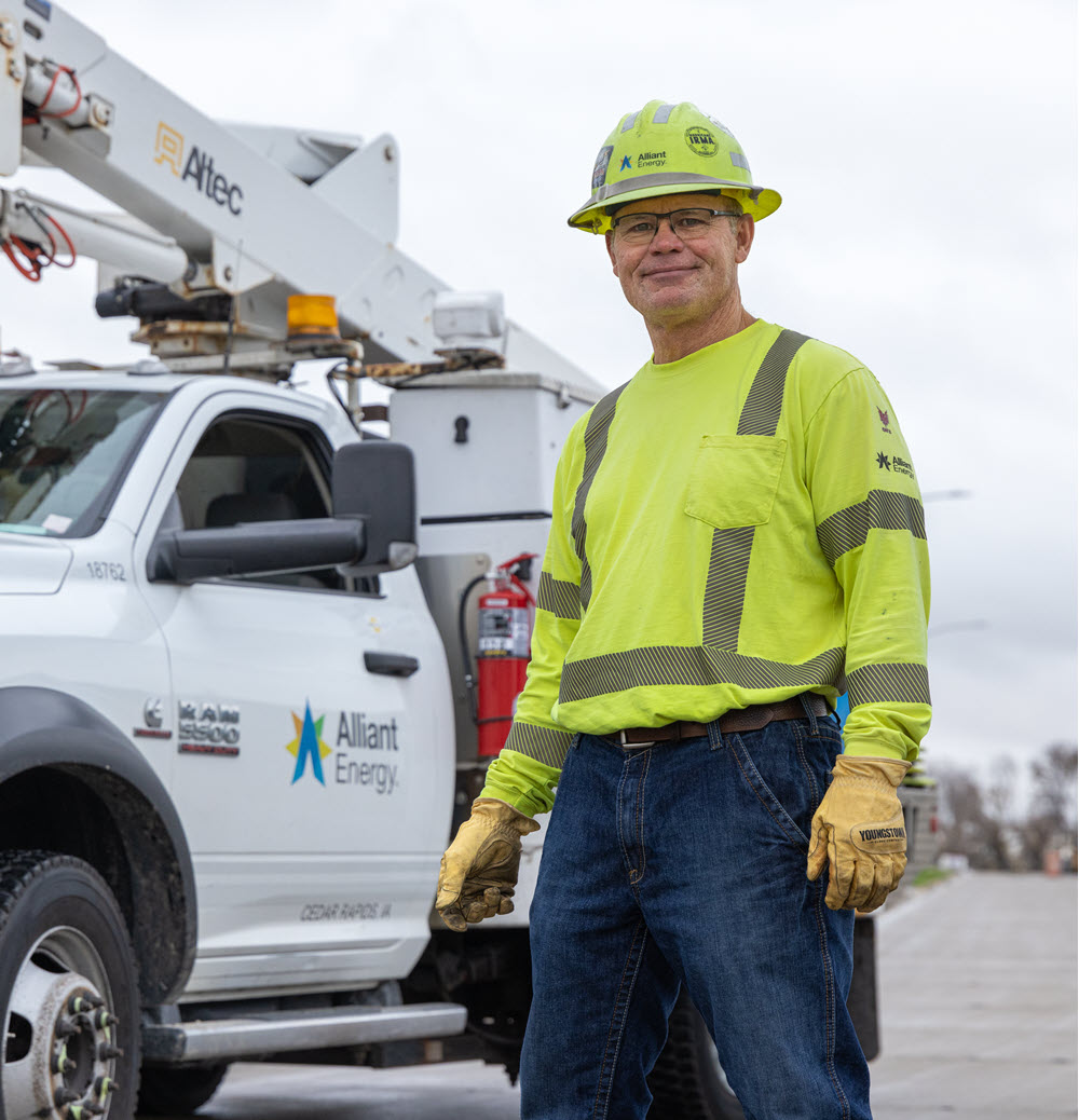 employee standing near a truck