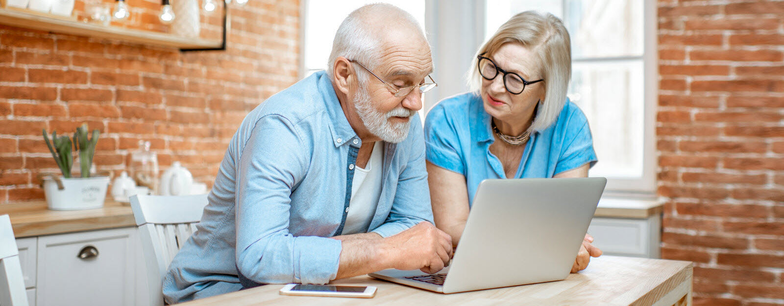 Couple looking at computer