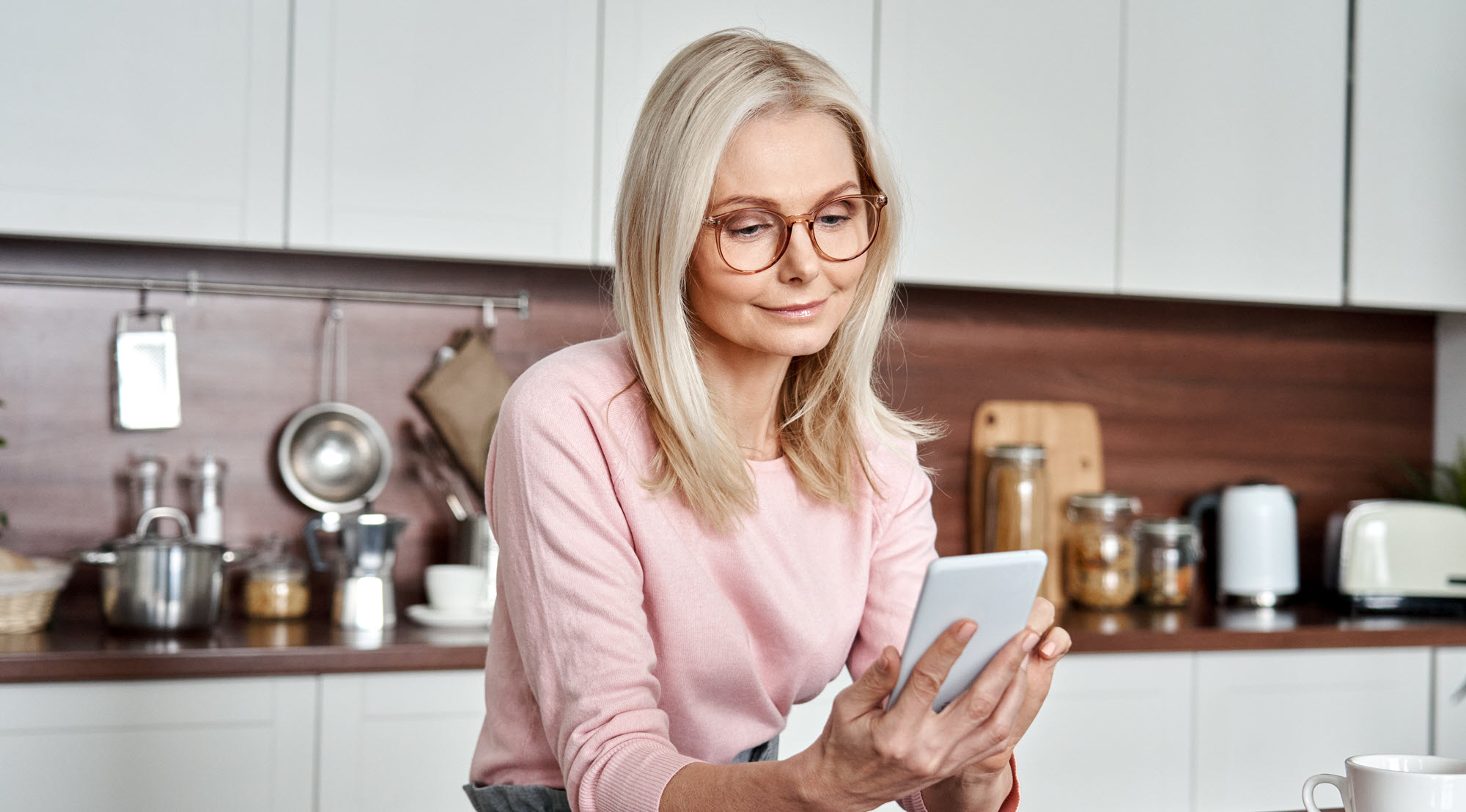 woman looking at her phone