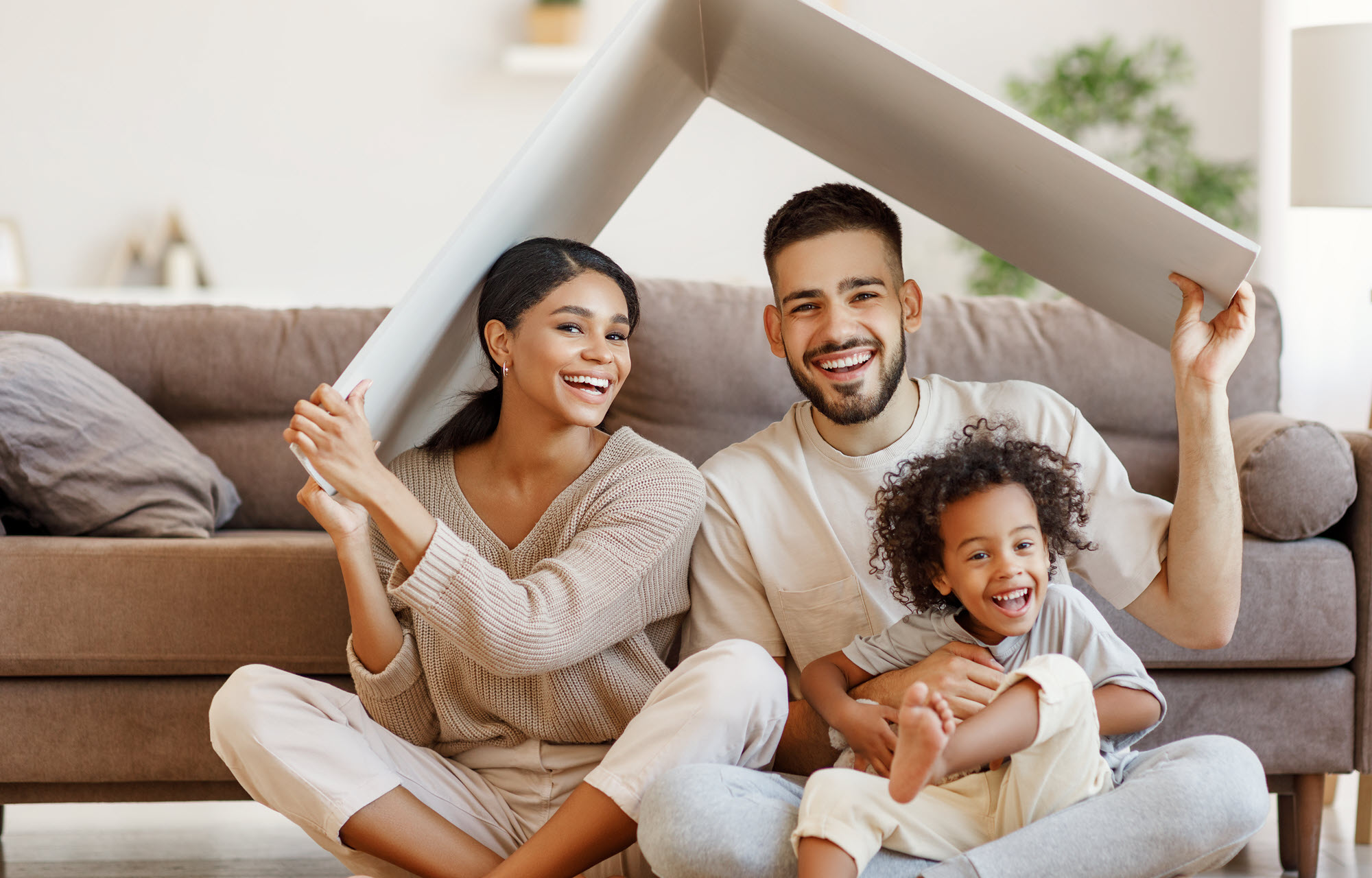 happy family playing in a living room