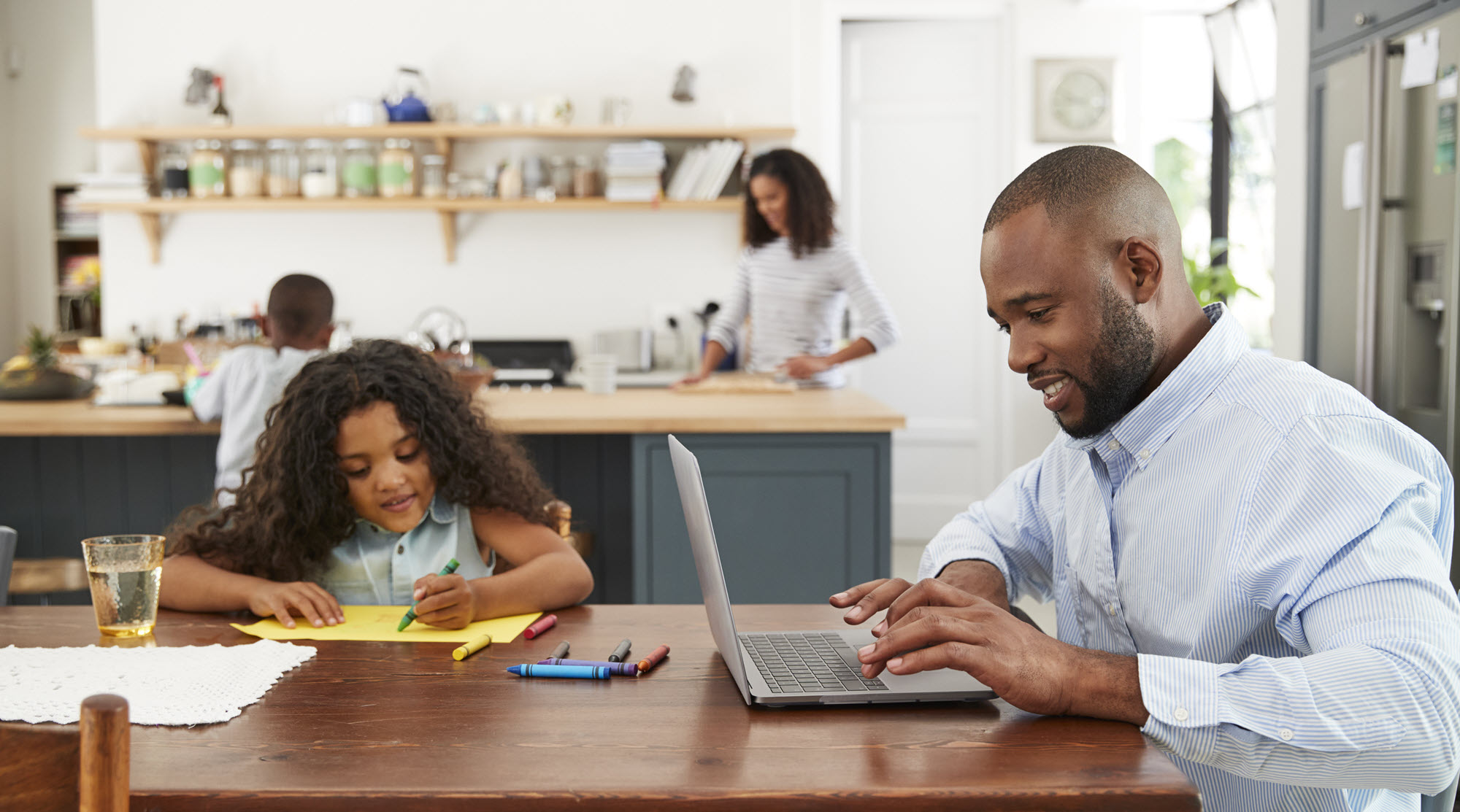 a family in a kitchen