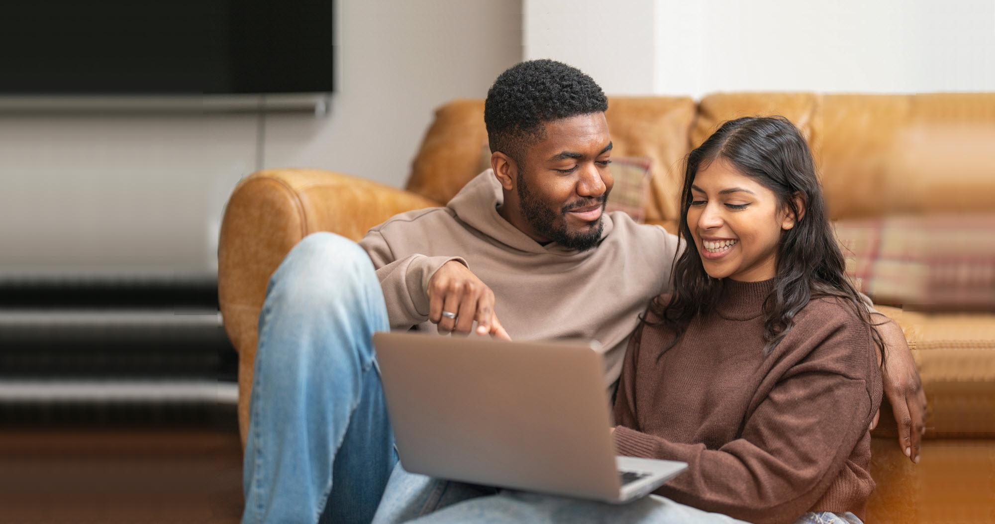 couple looking at a laptop