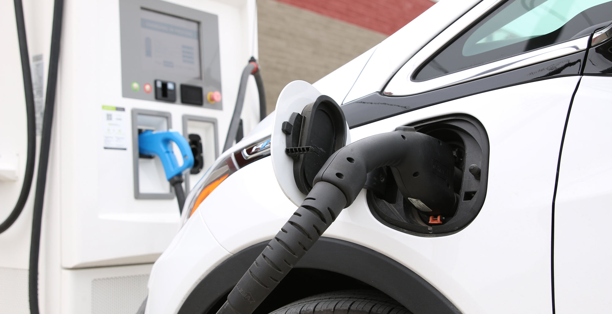 electric vehicle plugged into a charger