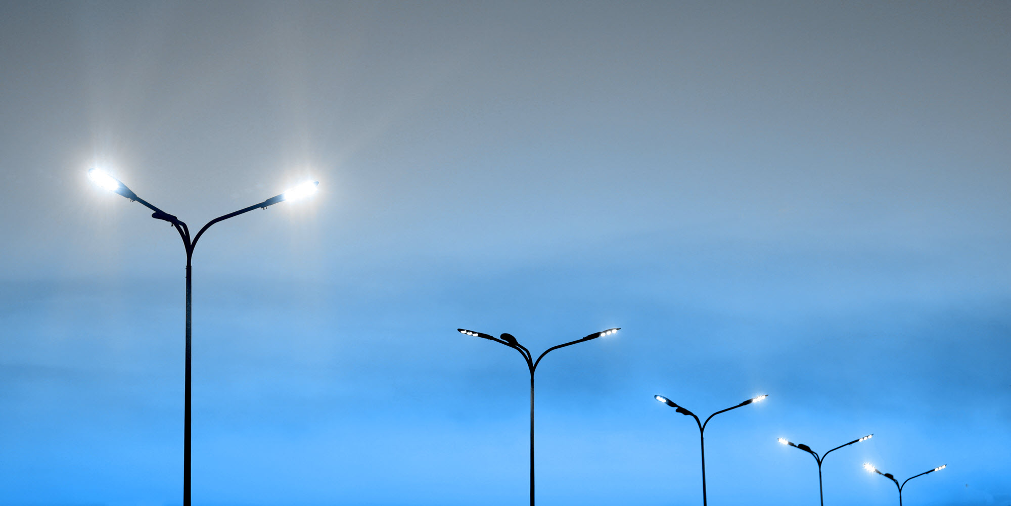 row of bright streetlights